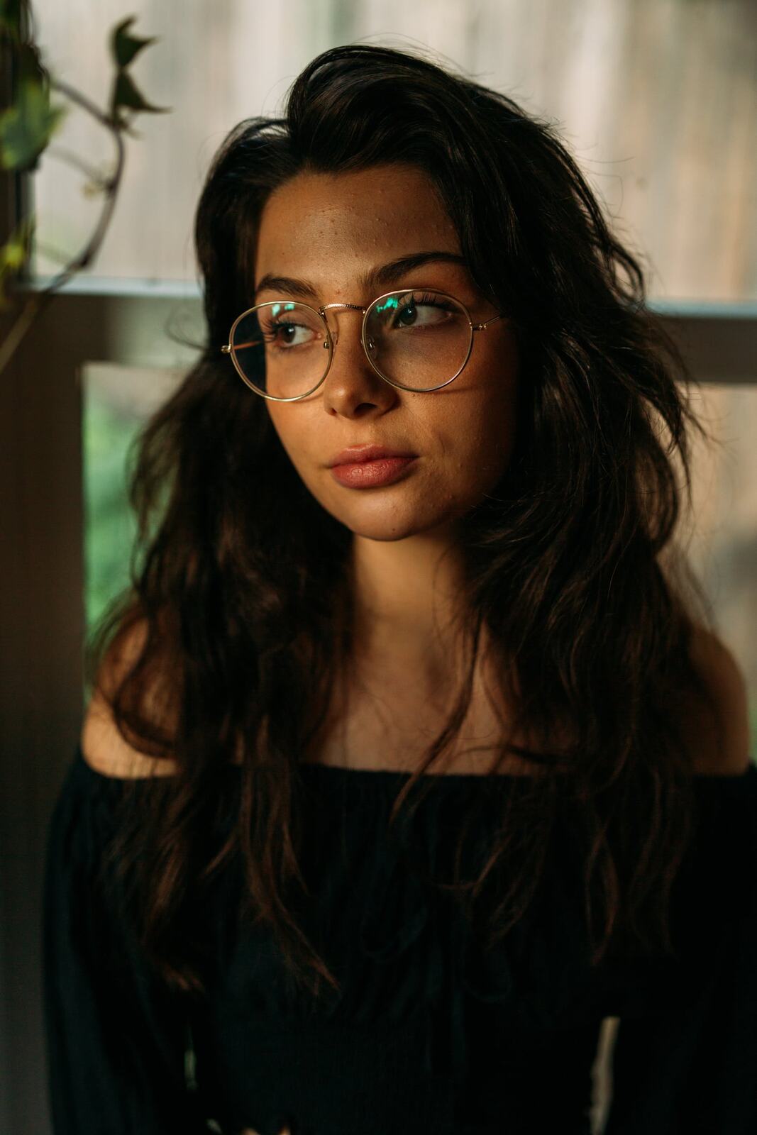 Mel in Reeds and Warm Dusk story frame 12: Bubbles, lake edge, reeds, glasses and dusk colour from a playful portrait story.
