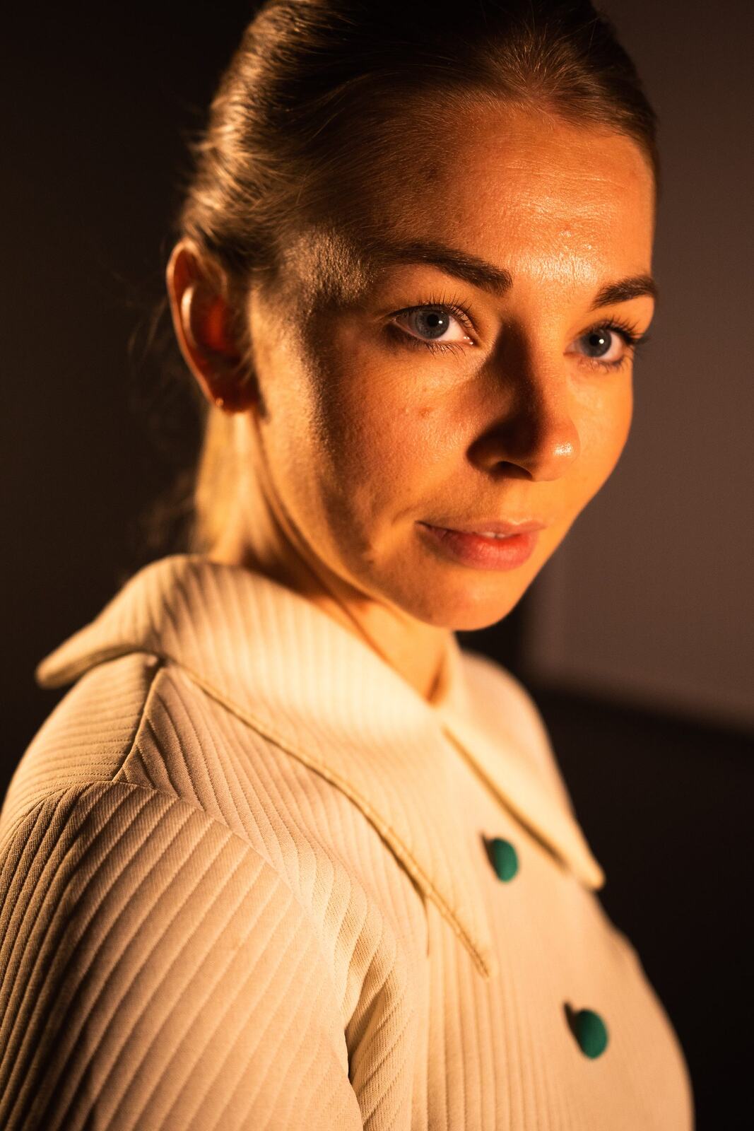 Angela in Colour portraits story frame 33: Angela in a colourful studio portrait set with clean expression, styled wardrobe, controlled light and a polished creative-portrait feel.