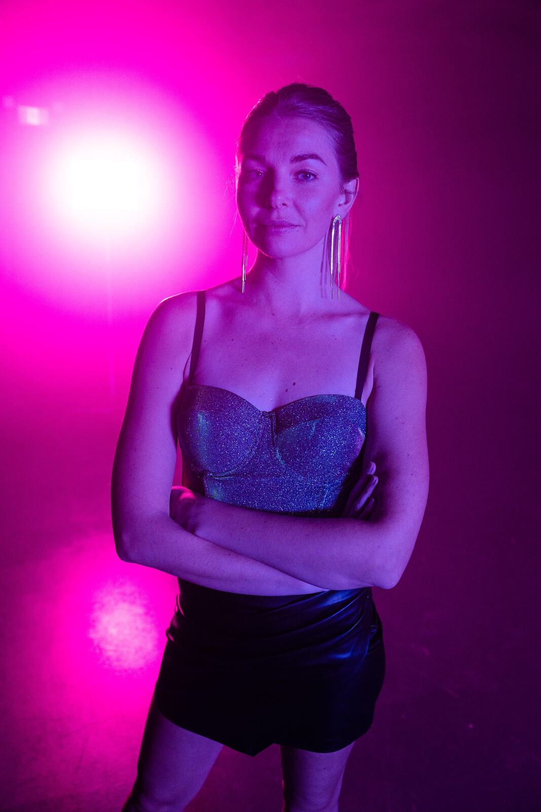 Angela in Colour portraits story frame 44: Angela in a colourful studio portrait set with clean expression, styled wardrobe, controlled light and a polished creative-portrait feel.