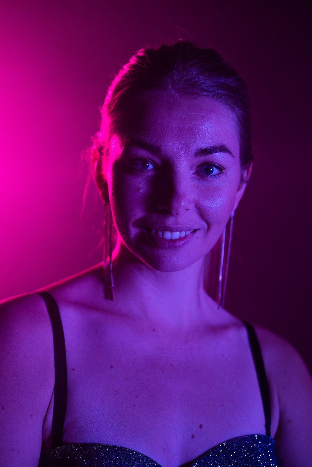 Angela in Colour portraits story frame 45: Angela in a colourful studio portrait set with clean expression, styled wardrobe, controlled light and a polished creative-portrait feel.