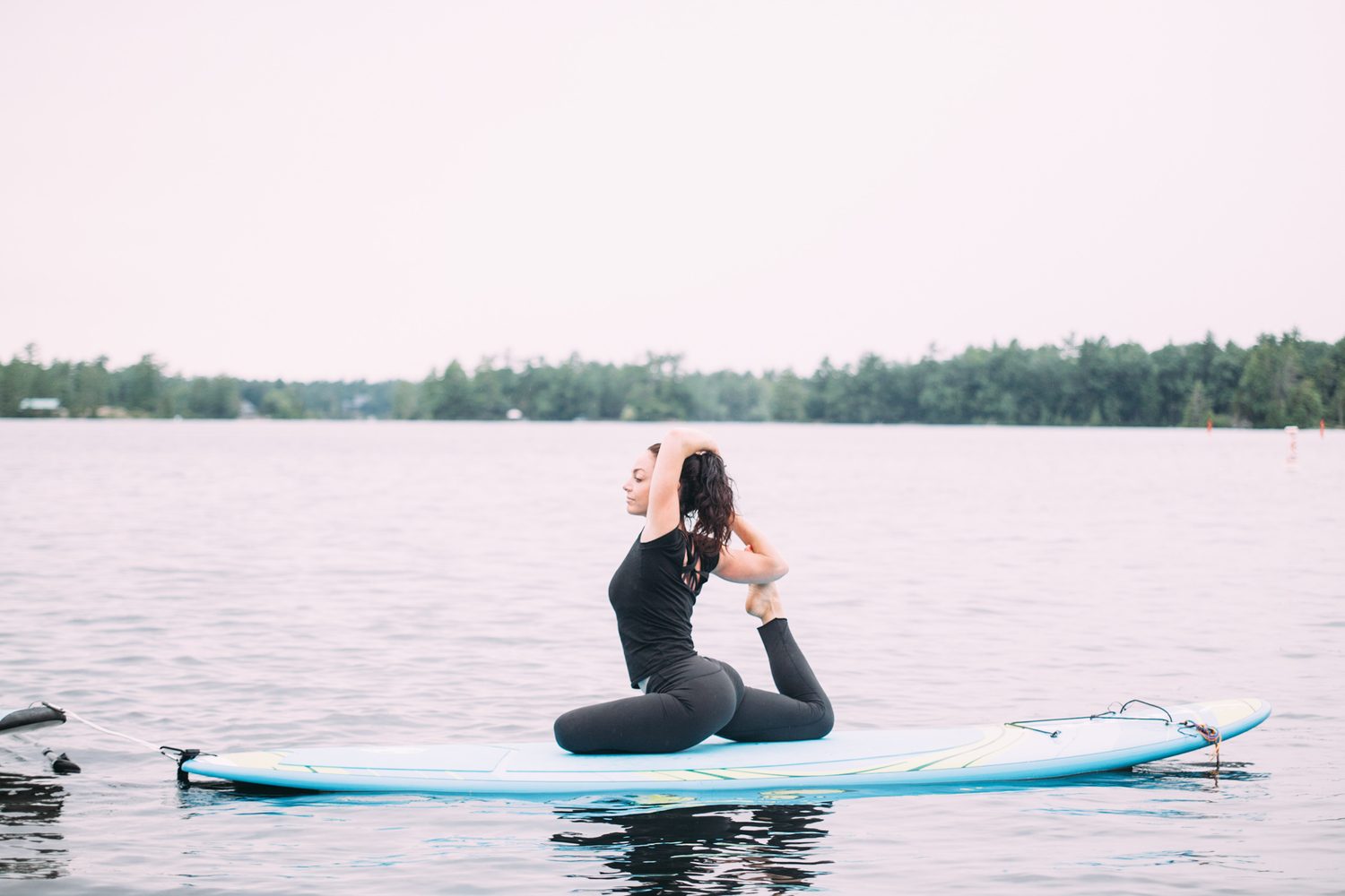 Ash and Jill, SUP Yoga corporate story frame 25: Corporate lifestyle photography for Ash and Jill on stand-up paddleboards, with yoga movement, instructor portraits and lake-based imagery for a wellness business.