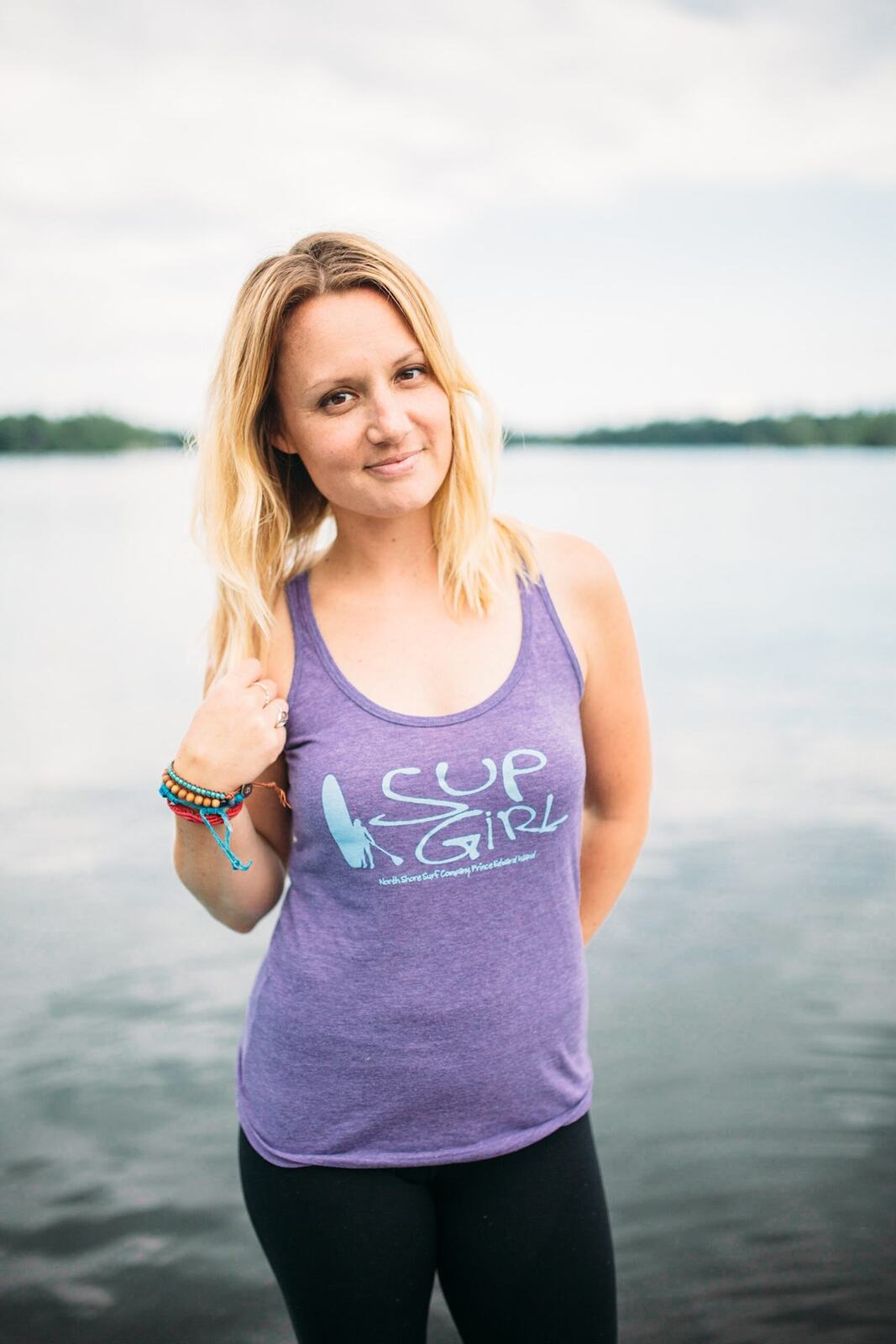 Ash and Jill, SUP Yoga corporate story frame 40: Corporate lifestyle photography for Ash and Jill on stand-up paddleboards, with yoga movement, instructor portraits and lake-based imagery for a wellness business.