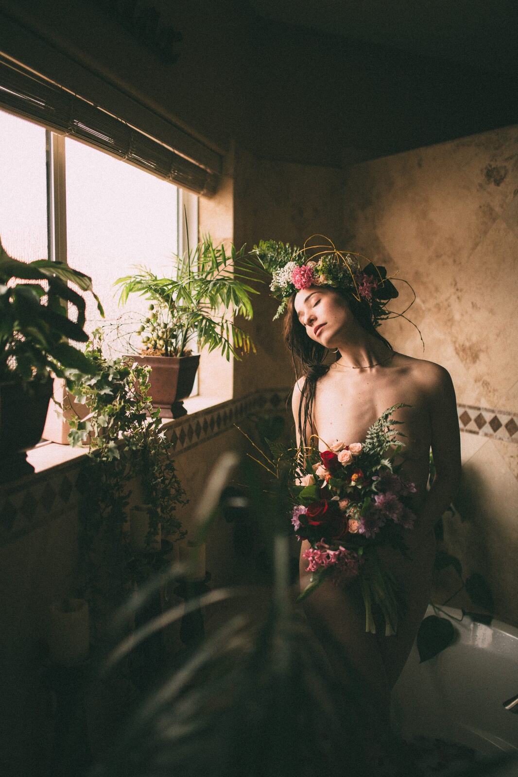 Bailey in Kelowna portraits story frame 44: Two portrait sessions moving through window light, body line, bold colour, foliage and floral-bath portraits.