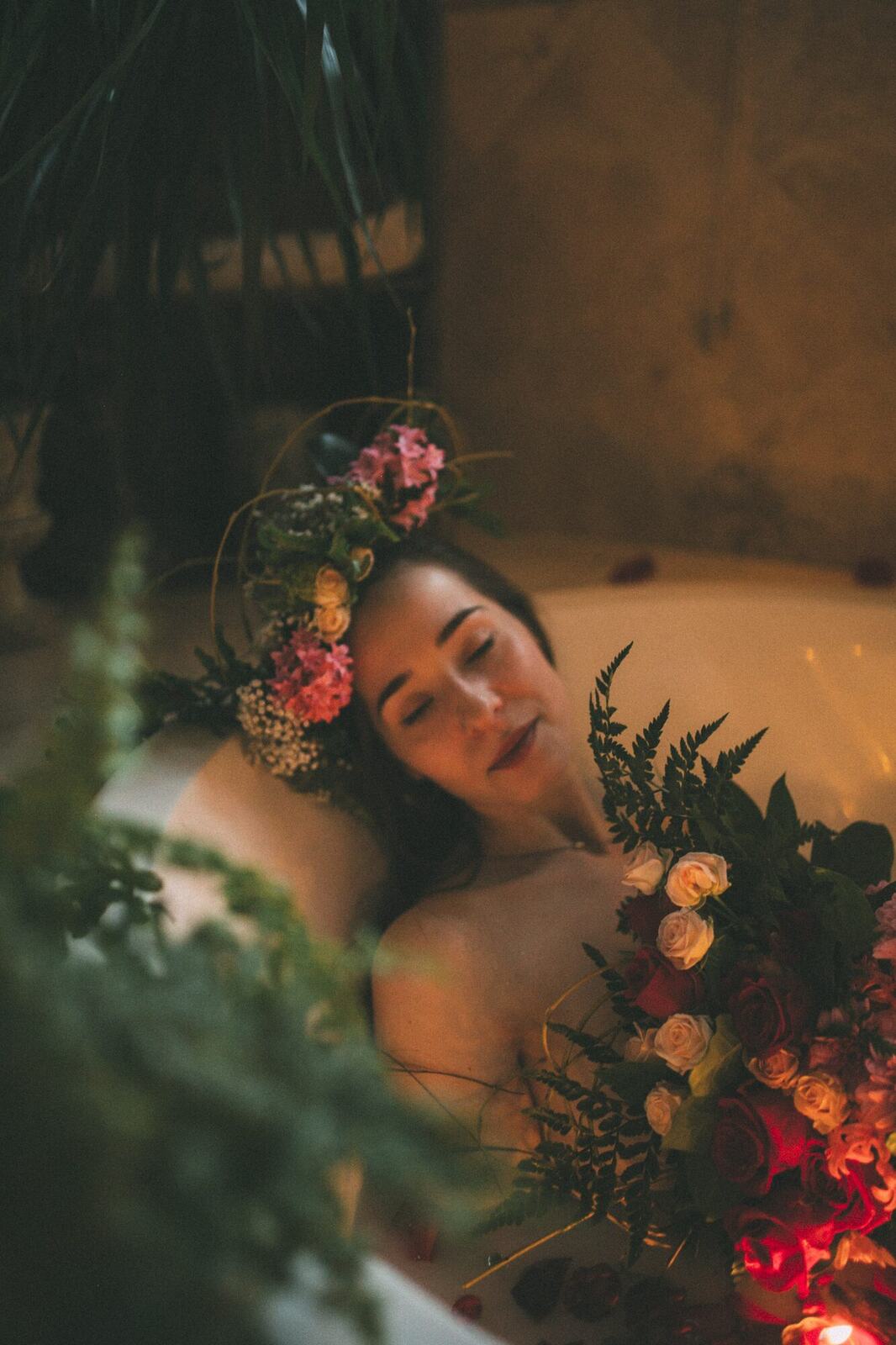 Bailey in Kelowna portraits story frame 52: Two portrait sessions moving through window light, body line, bold colour, foliage and floral-bath portraits.