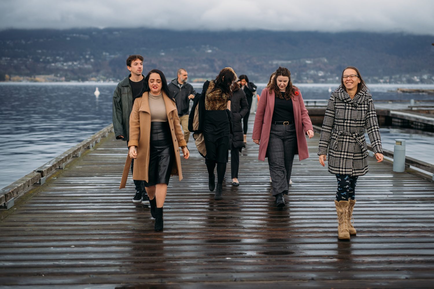 BrainTrust Canada Waterfront corporate story frame 18: Waterfront team and brand portraits for BrainTrust Canada in Kelowna, built around group photos, walking images and approachable nonprofit profile photography..