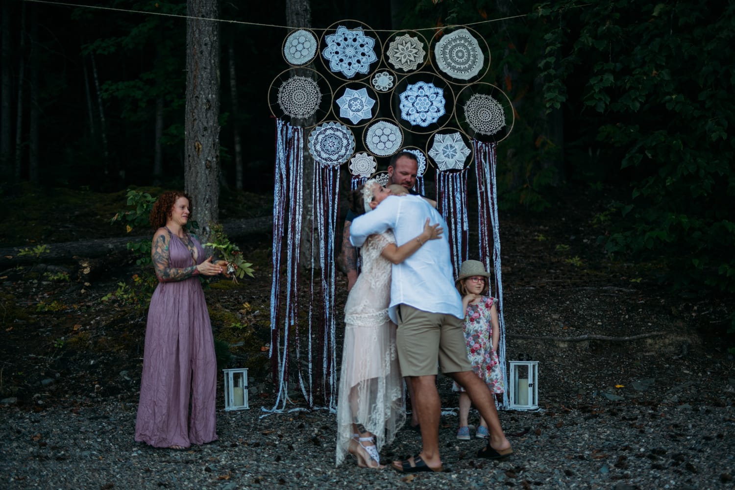 Carmel and Chris weddings story frame 17: A Sicamous and Shuswap Lake houseboat wedding that moved from water to beach, with friend-community overlap and a relaxed lakeside feeling..