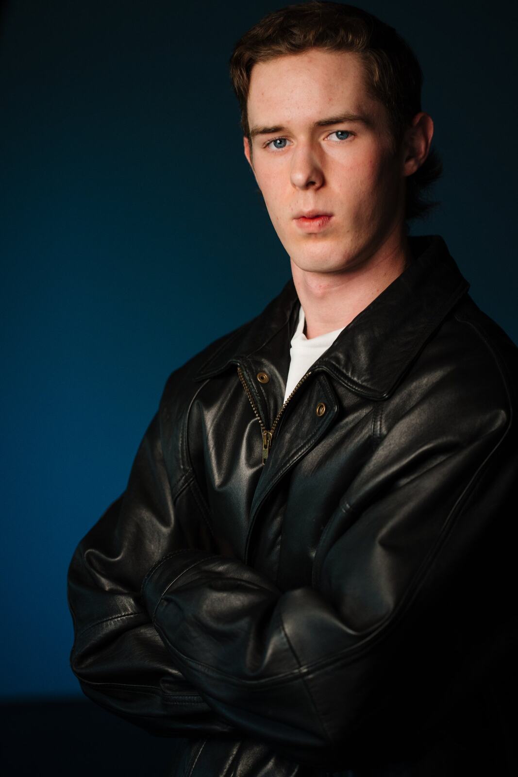 CATO Redux actor headshot on blue, photograph 27