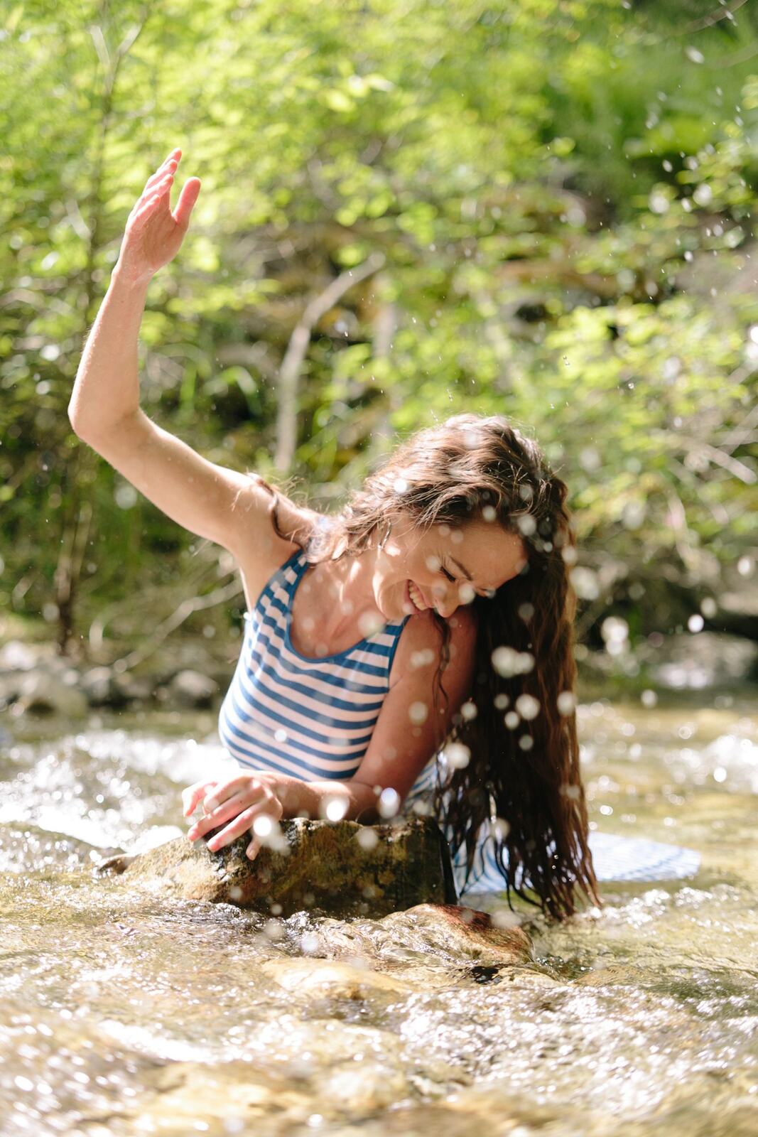 Charlotte, Rock the Dress portraits story frame 19: Charlotte Smith photographed for Rock the Dress near Salmon Arm, moving from blossoms and a yellow dress into creek, forest and horse portraits for the Canadian Cancer Society fundraiser.