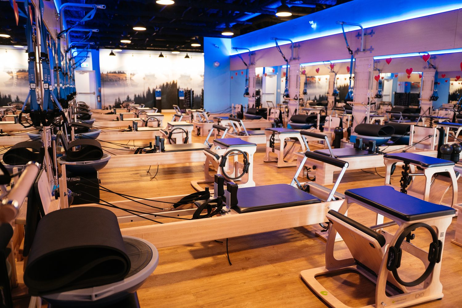 Club Pilates Barrhaven corporate story frame 12: Brand photography for Club Pilates Barrhaven in the Ottawa area, with studio interiors, staff portraits, private training rooms, equipment details and class movement for local marketing..