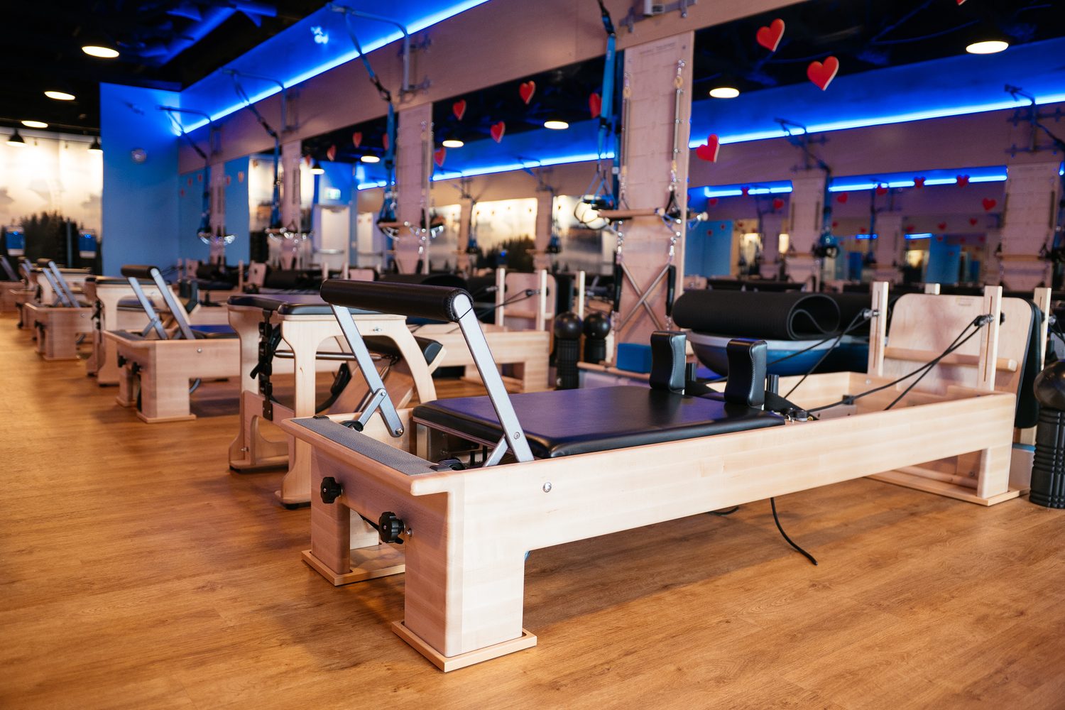 Club Pilates Barrhaven corporate story frame 17: Brand photography for Club Pilates Barrhaven in the Ottawa area, with studio interiors, staff portraits, private training rooms, equipment details and class movement for local marketing..