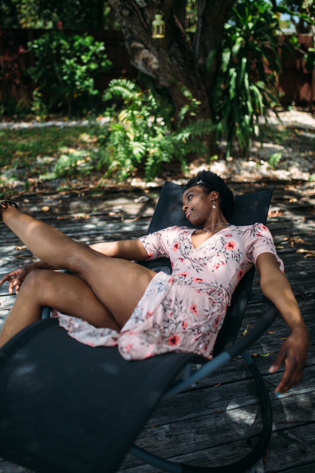 Dee-J in Miami portraits story frame 8: Two days with Dee-J in Miami, moving from a bright poolside portrait story to a second pool sequence and green-dress portraits along the riverbank.