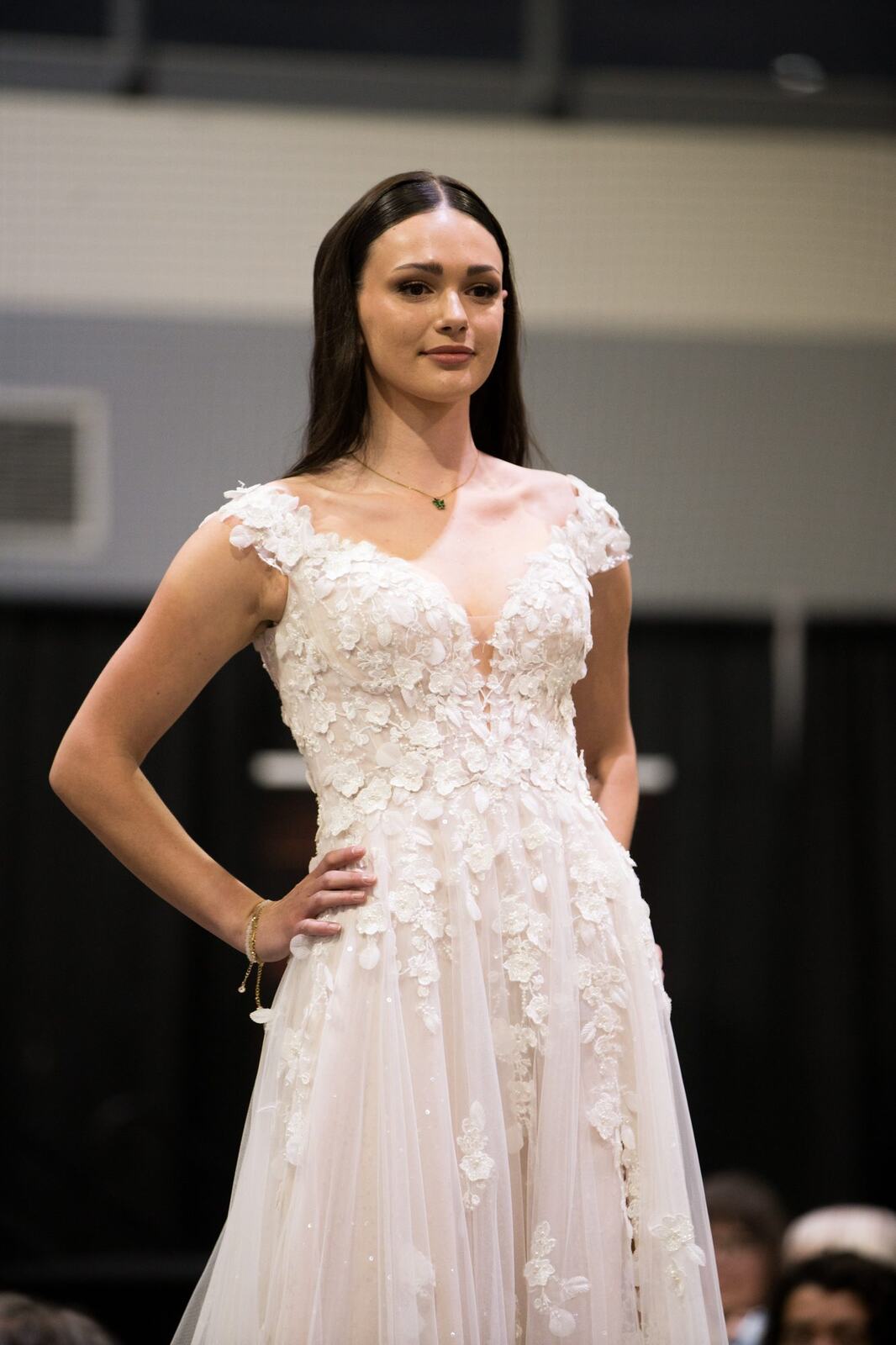 Diva Den at Kelowna Bridal Extravaganza corporate story frame 2: Runway and bridal beauty photography for Diva Den Day Spa at Kelowna Bridal Extravaganza, with women-focused looks from Sunny, Montana, Elena, Beth and Sky for Okanagan wedding and beauty brands..