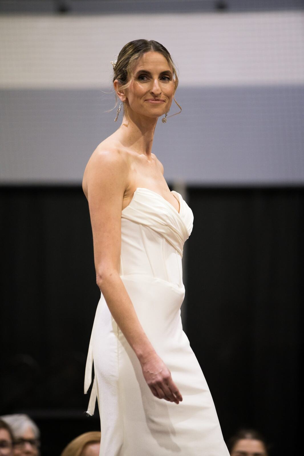 Diva Den at Kelowna Bridal Extravaganza corporate story frame 20: Runway and bridal beauty photography for Diva Den Day Spa at Kelowna Bridal Extravaganza, with women-focused looks from Sunny, Montana, Elena, Beth and Sky for Okanagan wedding and beauty brands..
