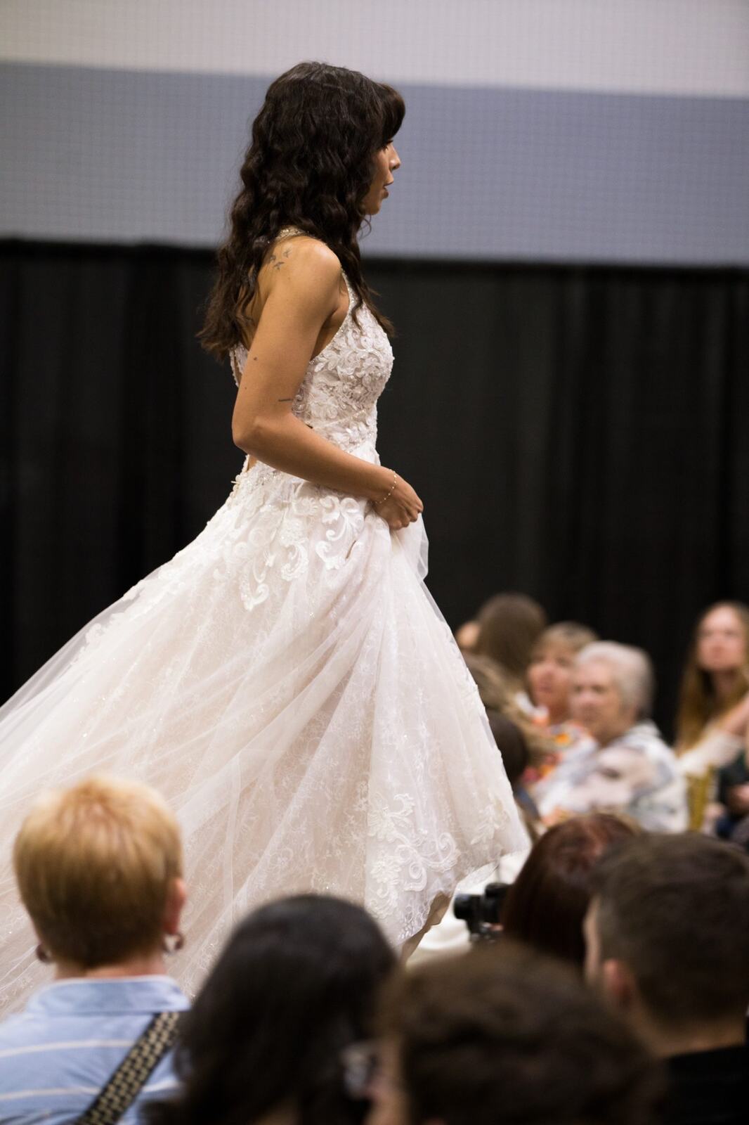 Diva Den at Kelowna Bridal Extravaganza corporate story frame 33: Runway and bridal beauty photography for Diva Den Day Spa at Kelowna Bridal Extravaganza, with women-focused looks from Sunny, Montana, Elena, Beth and Sky for Okanagan wedding and beauty brands..