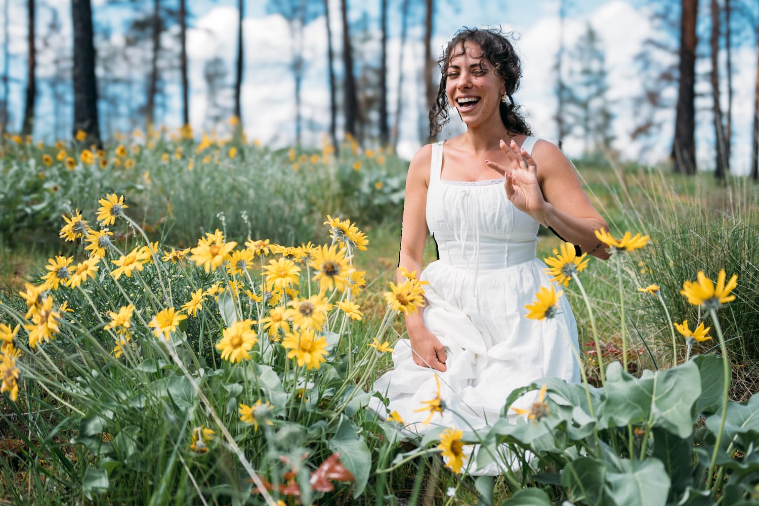 Giuliana at LoveReins portraits story frame 1: Equestrian portrait session at Love Reins Ranch in Lake Country, BC, with Giuliana, horses, white-dress portraits, Western cowgirl styling, ranch fencing, riding frames and warm Okanagan light..