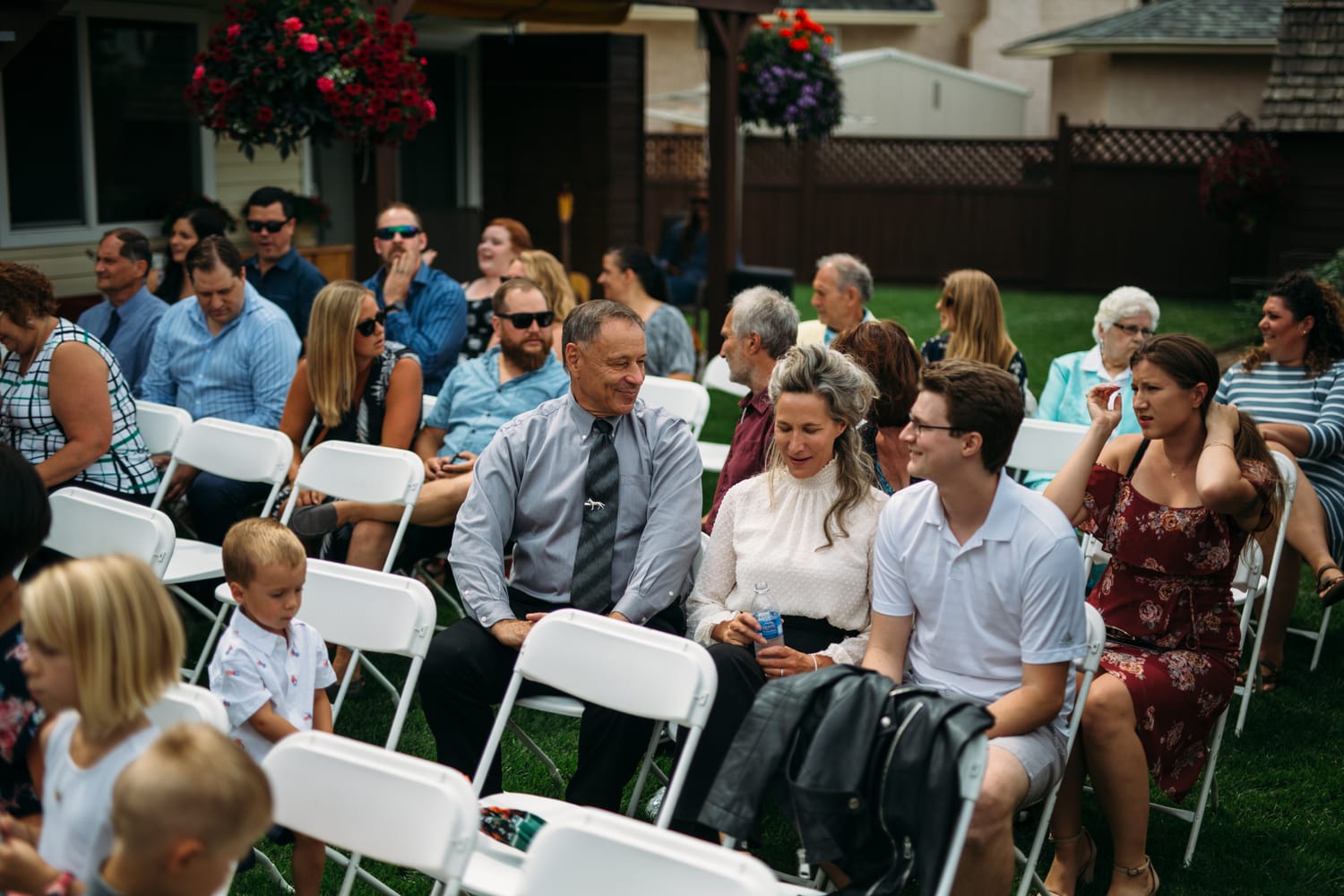 Hannah and Max weddings story frame 4: A private backyard wedding in Kamloops, with family closeness, friend energy, weather and detail moments that keep the day alive..