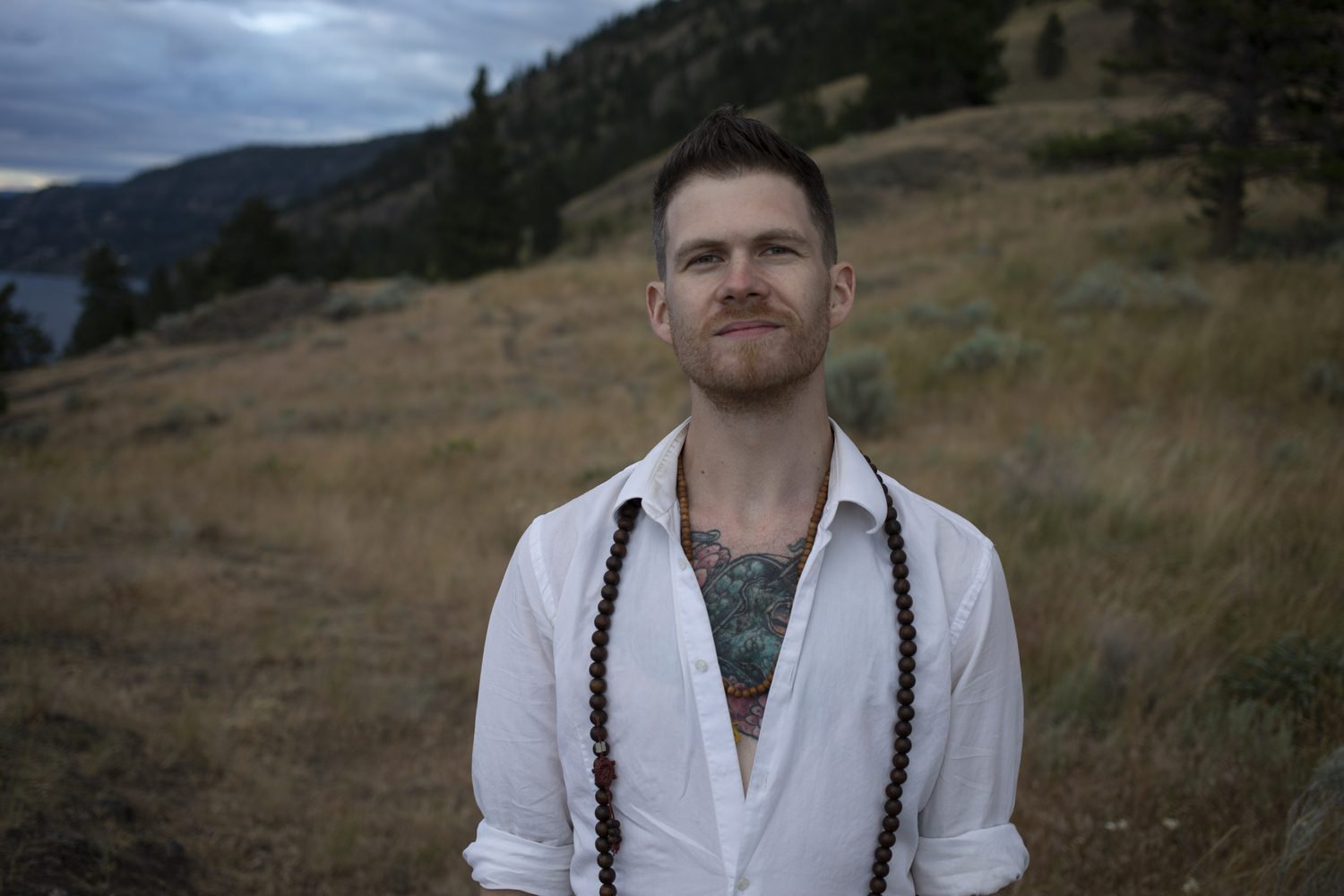 Jacob standing in the field for a direct portrait.
