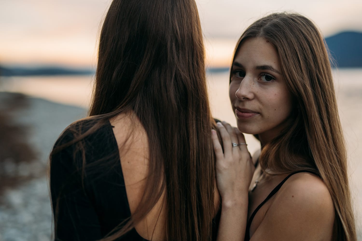 Jenna and Macie, From Eden portraits story frame 13: Jenna and Macie From Eden in a singer-songwriter portrait set with dark wardrobe, close expression, studio shape and music-publicity atmosphere.