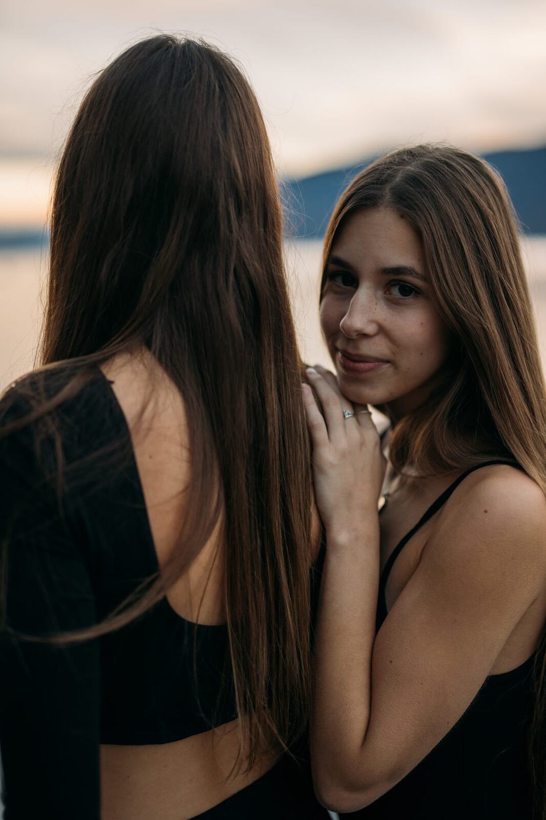 Jenna and Macie, From Eden portraits story frame 14: Jenna and Macie From Eden in a singer-songwriter portrait set with dark wardrobe, close expression, studio shape and music-publicity atmosphere.