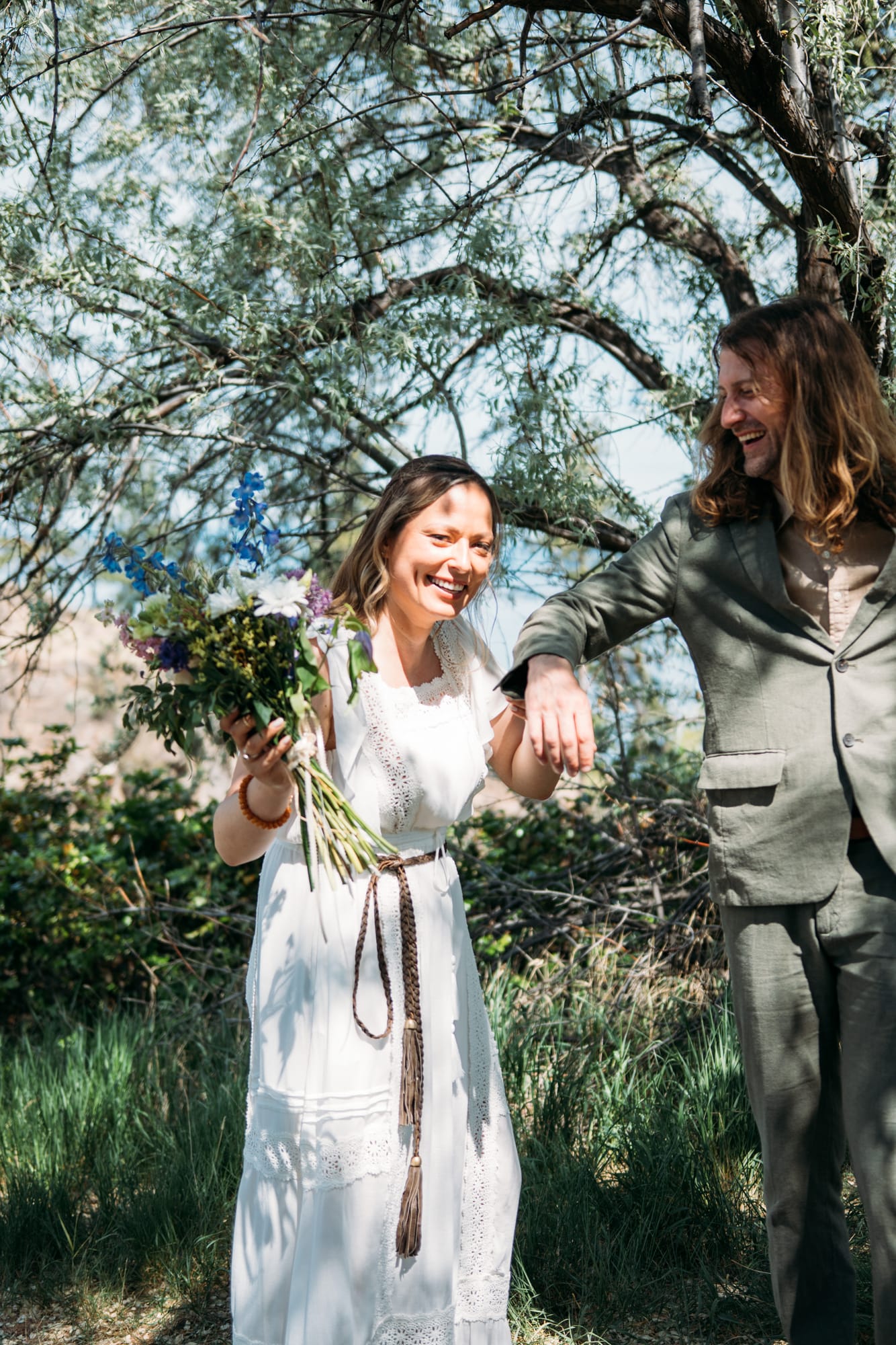 Kristina and Mark weddings story frame 20: A Bertram Creek wedding in South Kelowna with Okanagan Lake light, film-friend history, family texture and Lithuanian food and planning details..