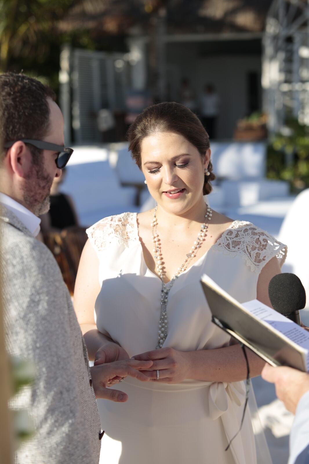 Kyra reading during the beach ceremony