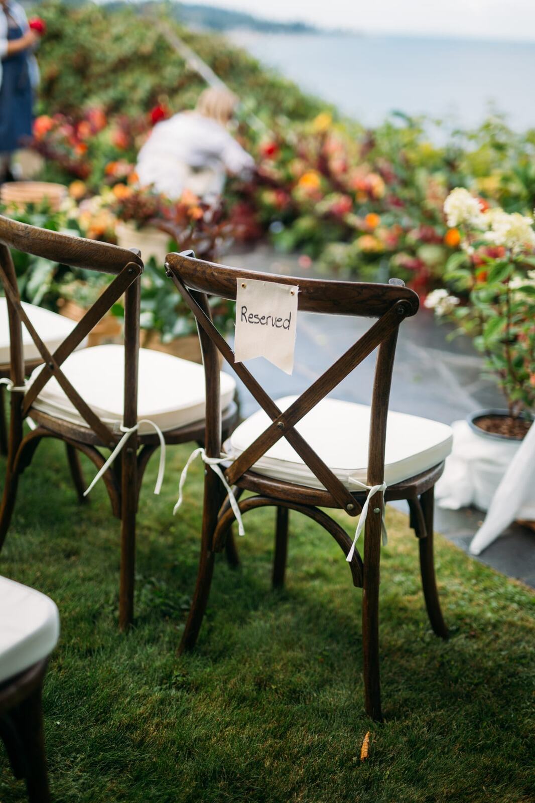 Mara and Casey weddings story frame 5: A Vancouver Island private-home wedding near Qualicum Beach, with Bowser prep, Friday gathering energy, custom vendors, kids, friends and cool Island air..