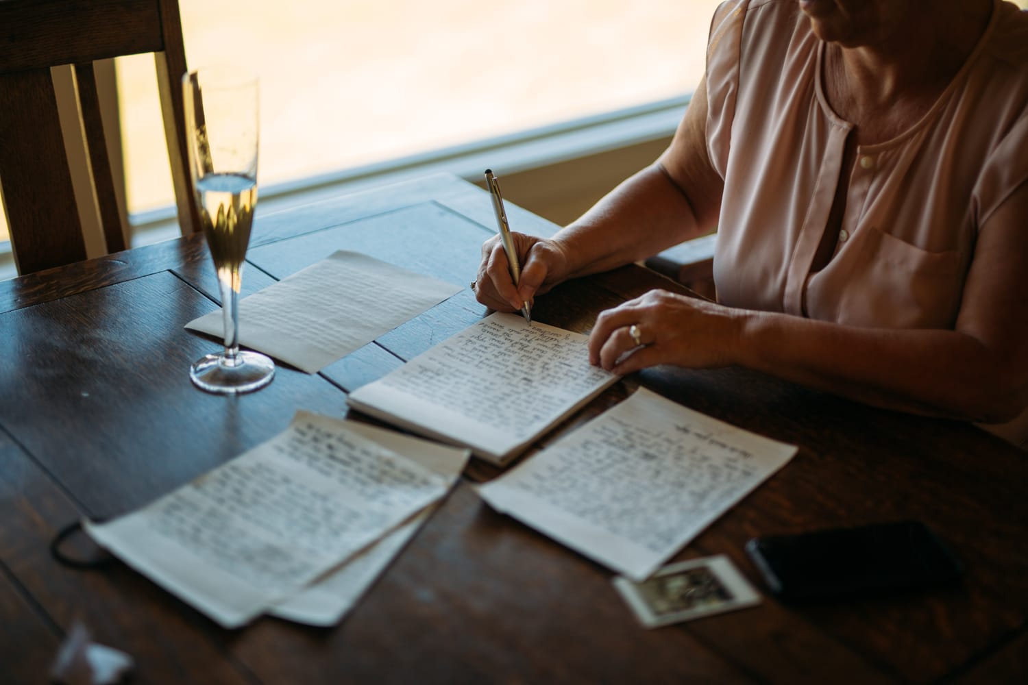 Mara and Casey weddings story frame 13: A Vancouver Island private-home wedding near Qualicum Beach, with Bowser prep, Friday gathering energy, custom vendors, kids, friends and cool Island air..