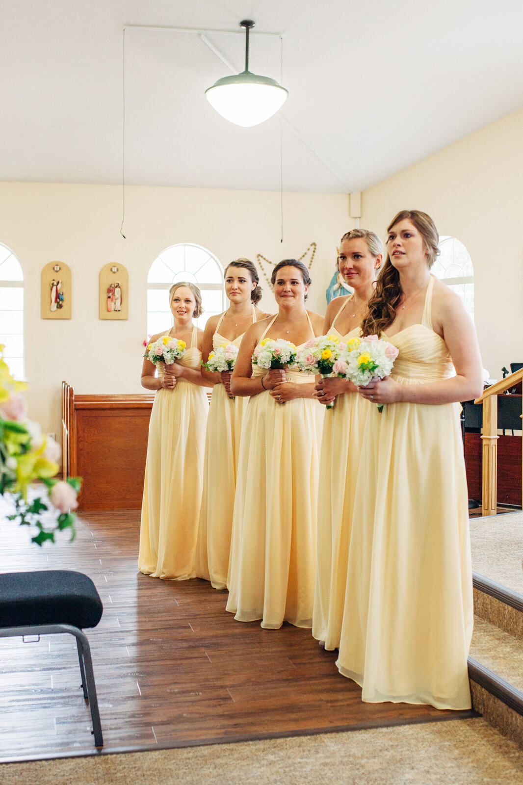 Bridesmaids gathered inside the church