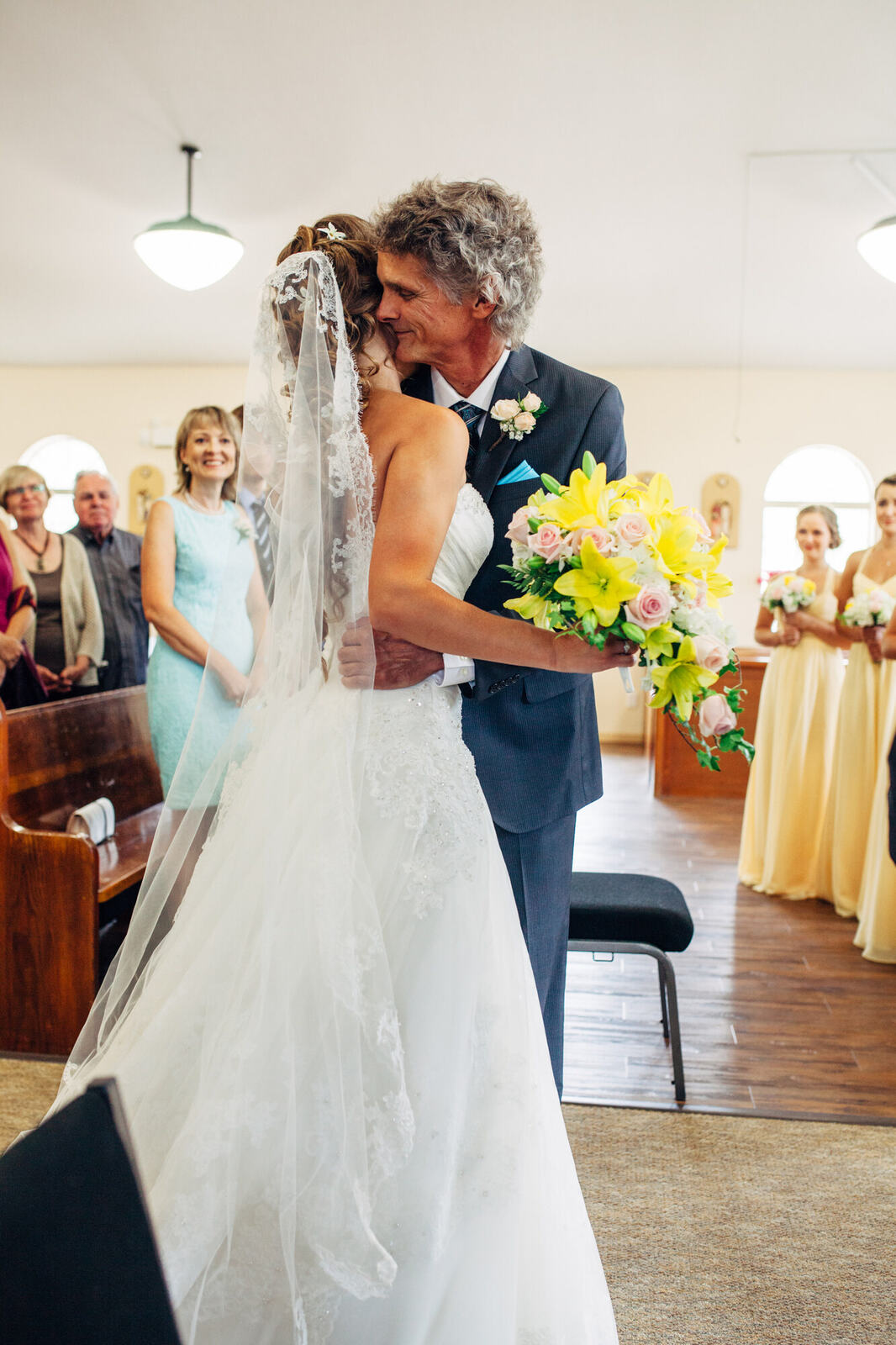 Mel entering the church with her father