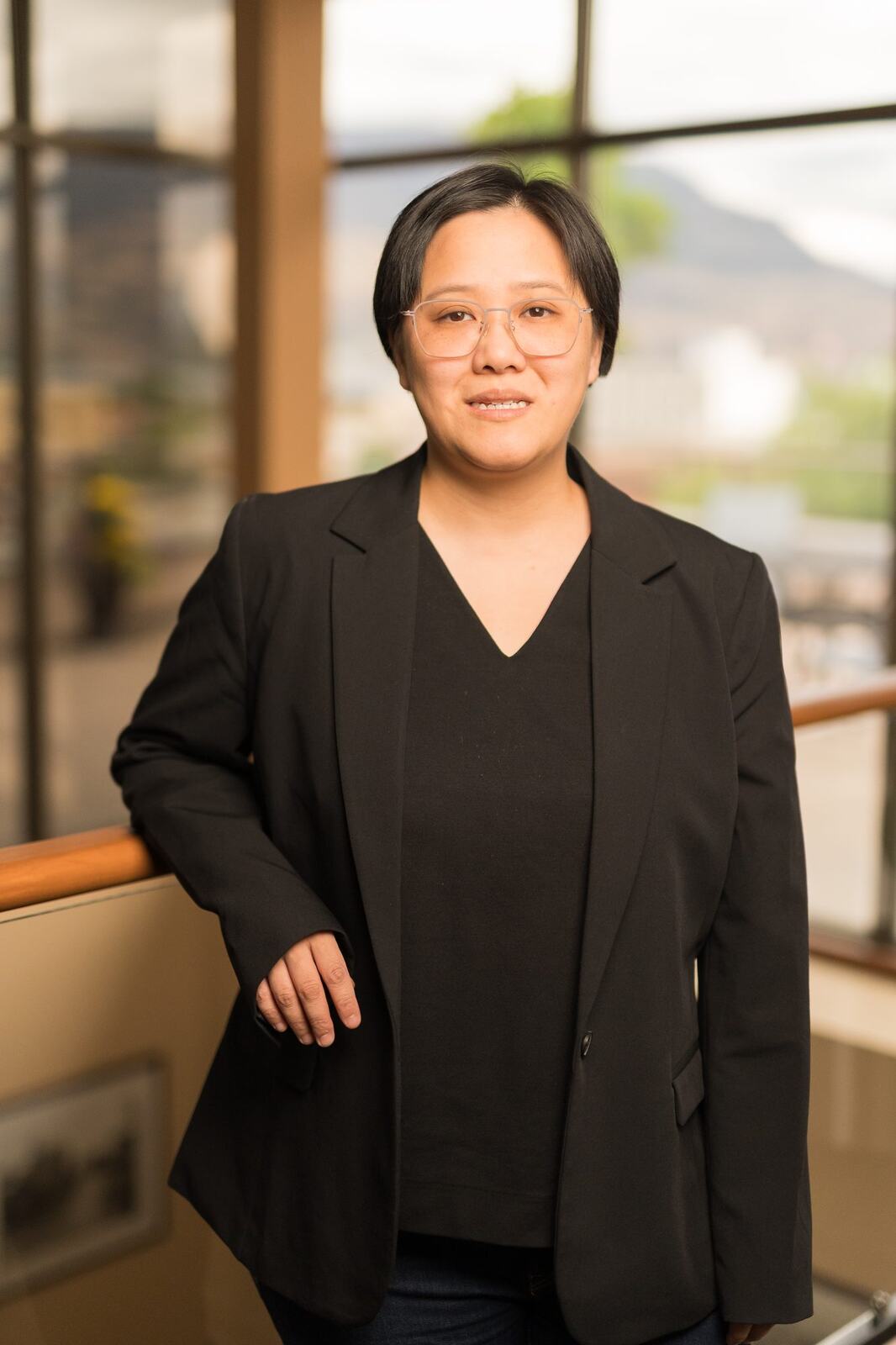 Pushor Mitchell LLP corporate story frame 10: Corporate portraits for Pushor Mitchell LLP in Kelowna, with polished office headshots, approachable legal-team profile images and business photography for a professional law firm..