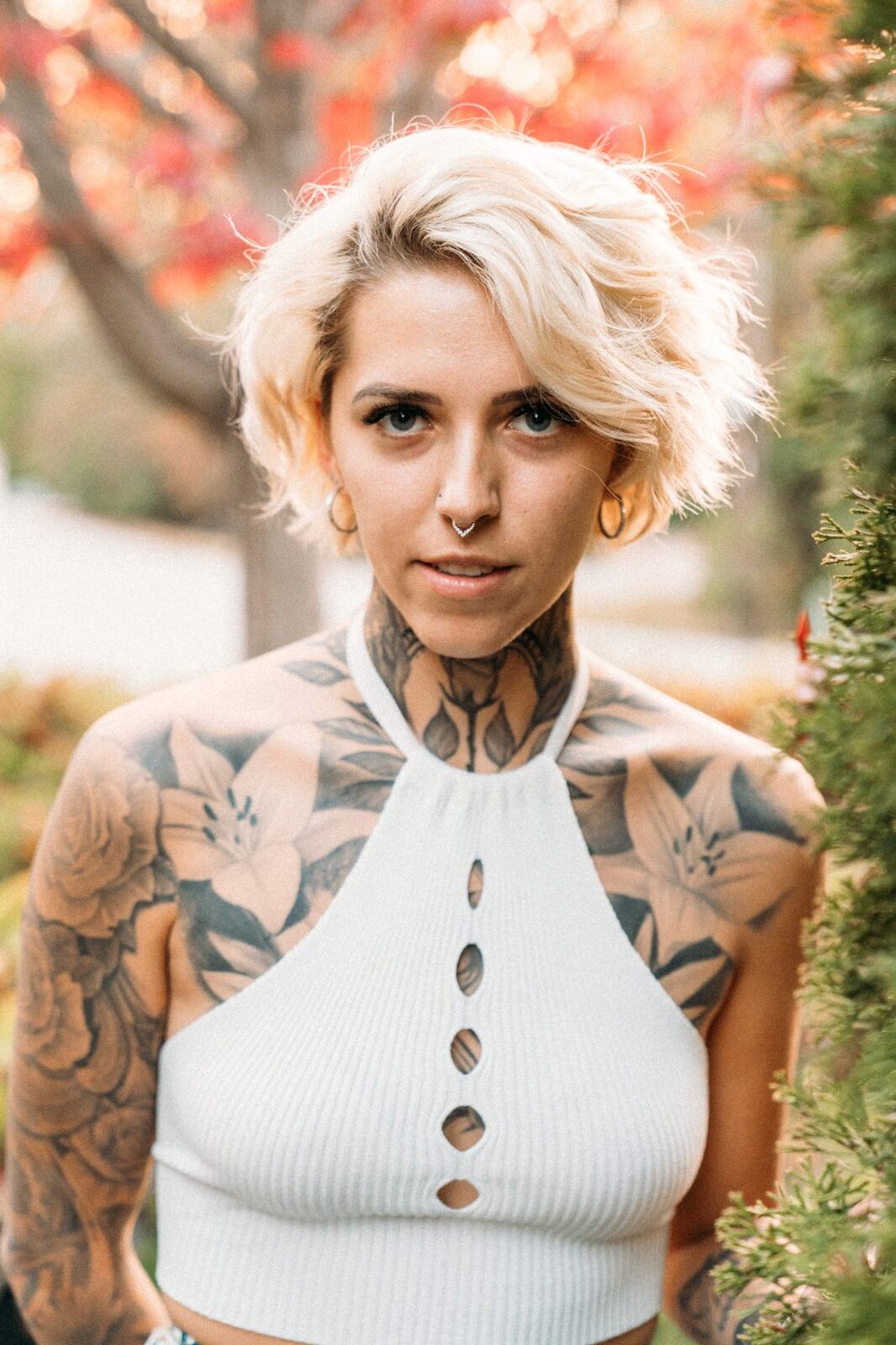 Rayleigh in Garden and Rose Light portraits story frame 4: Rayleigh moves from a flowered garden into rose-lit rooms, mirrors, tea and evening shadows in a portrait story with warmth and edge. Photographed in Kelowna, BC.