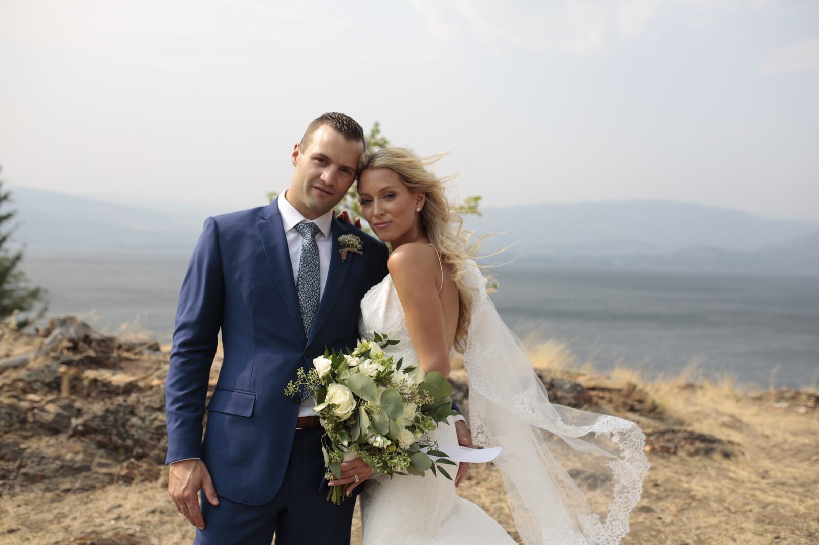 Sarah and Greg standing together on the bluff