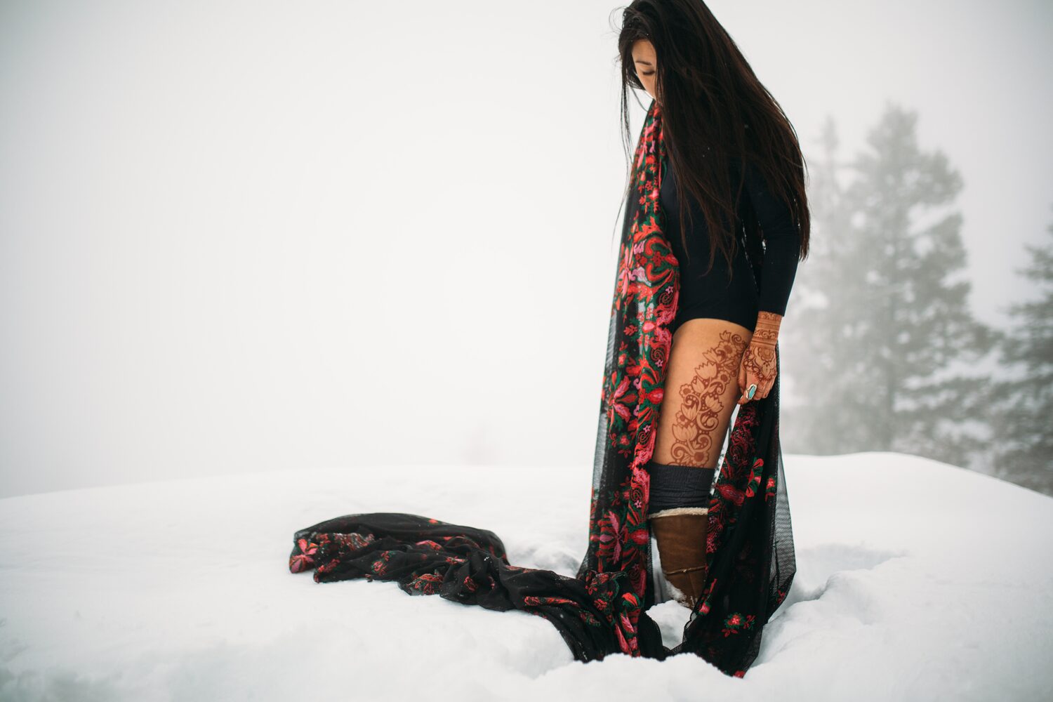 Sarah: Henna, Snow and Candlelight portraits story frame 12: A four-part portrait story with Sarah in Kelowna, moving from a living-room henna session into snow, a daylight coconut-milk bath and a candlelit bath.