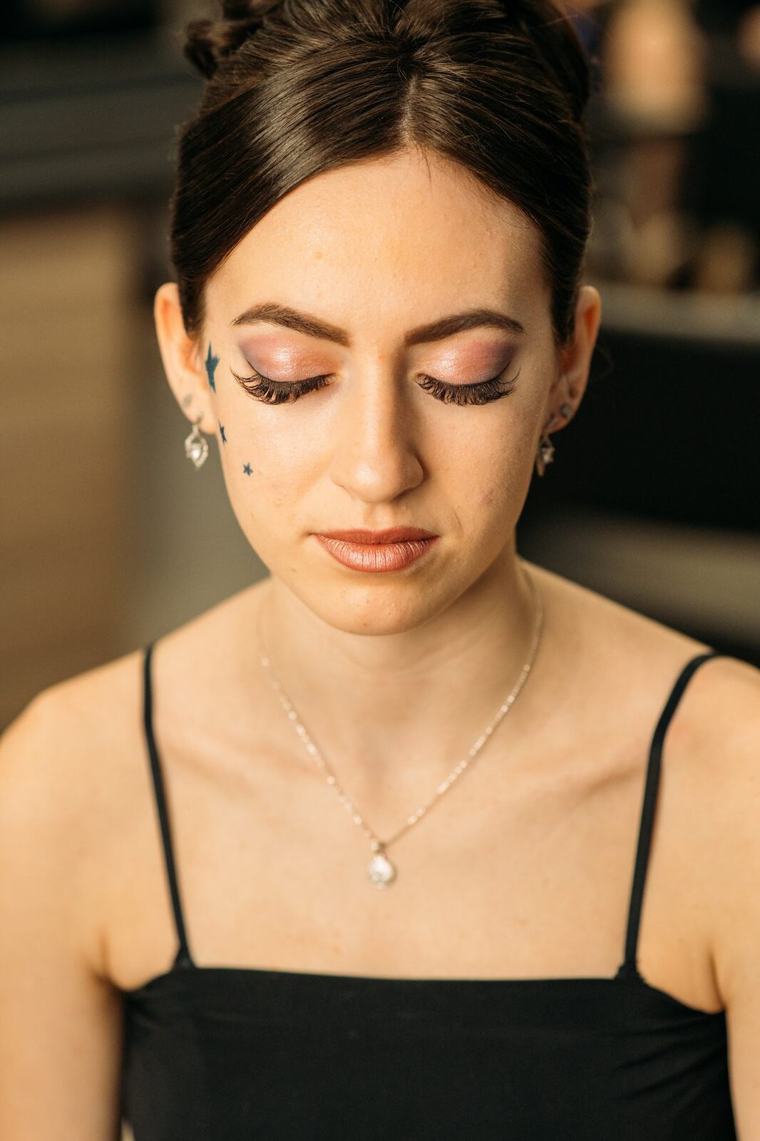 Sass Hair and Diva Den corporate story frame 4: Special-event, prom and grad beauty portraits for Sass Hair and Diva Den in Kelowna, with finished hair, makeup, salon atmosphere and polished vendor images..