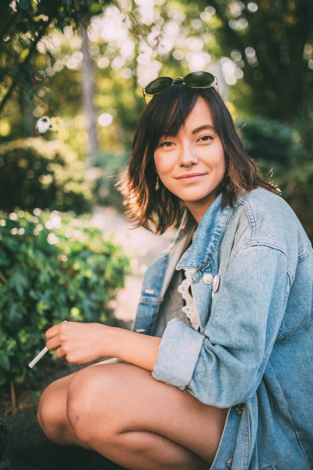 Savannah in Vancouver portraits story frame 3: Vancouver portraits for Savannah with pale walls, green city paths, soft street light and a gentle late-afternoon portrait rhythm.