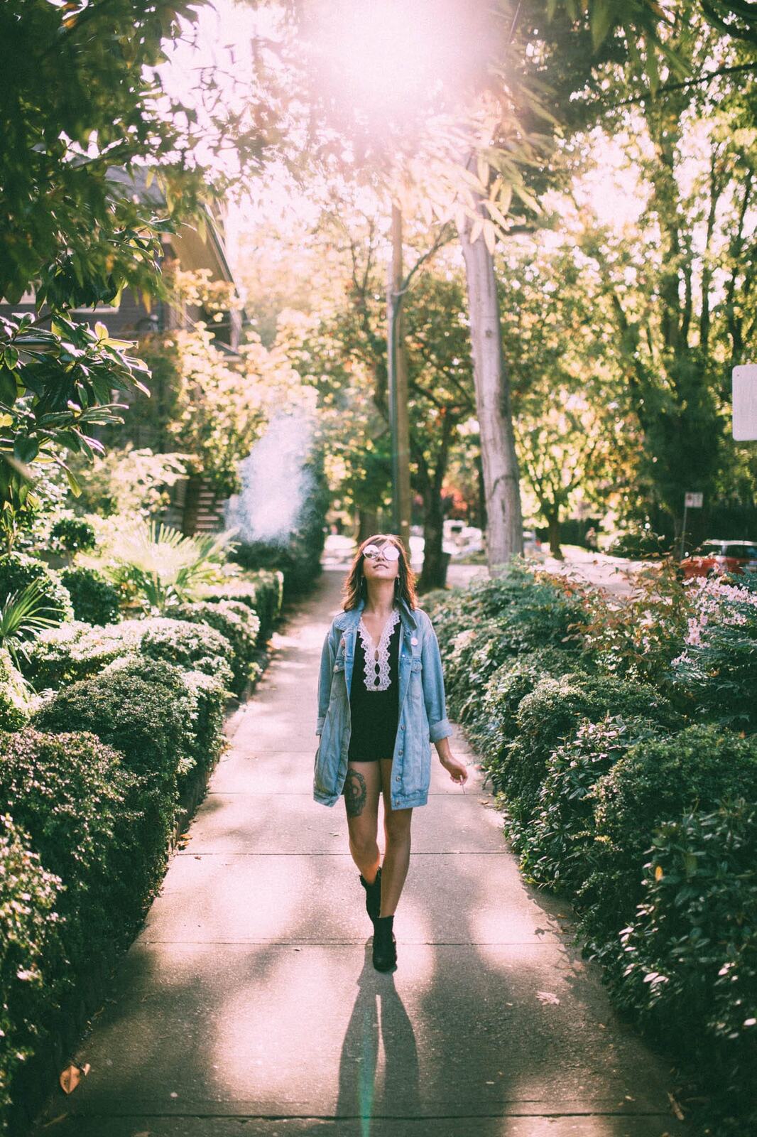 Savannah in Vancouver portraits story frame 8: Vancouver portraits for Savannah with pale walls, green city paths, soft street light and a gentle late-afternoon portrait rhythm.