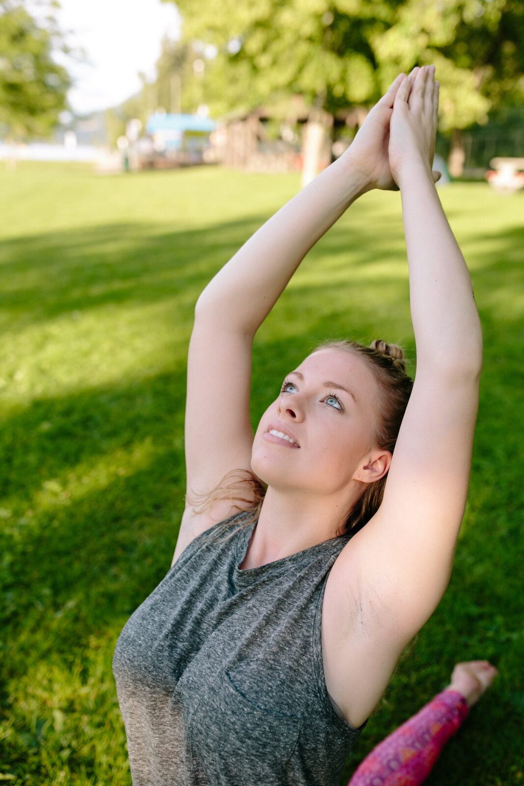 Shani Yoga corporate story frame 2: Wellness portraits for Shani with yoga movement, shoreline light and wooded settings, created for a personal brand with an active outdoor focus.