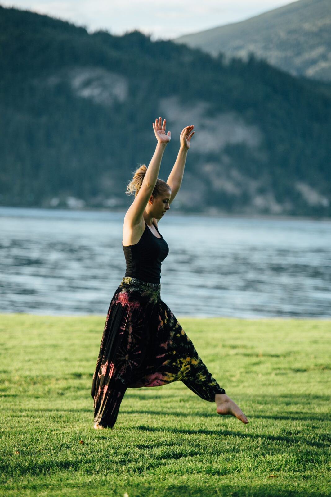 Shani Yoga corporate story frame 18: Wellness portraits for Shani with yoga movement, shoreline light and wooded settings, created for a personal brand with an active outdoor focus.