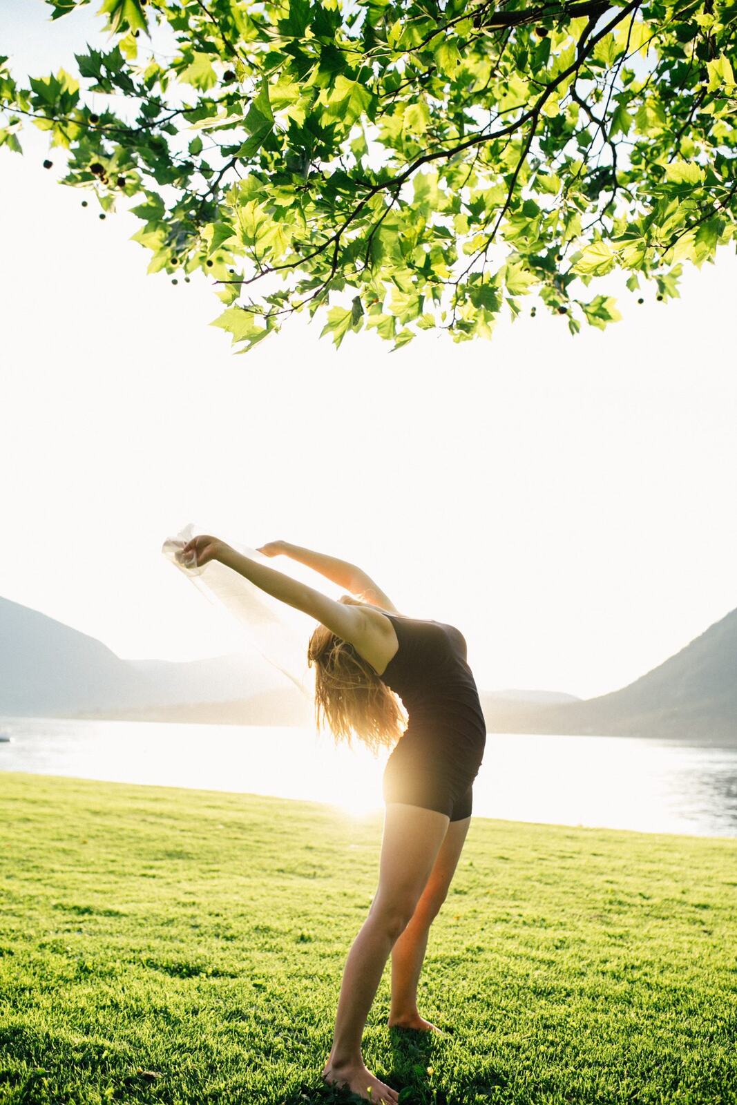 Shani Yoga corporate story frame 28: Wellness portraits for Shani with yoga movement, shoreline light and wooded settings, created for a personal brand with an active outdoor focus.