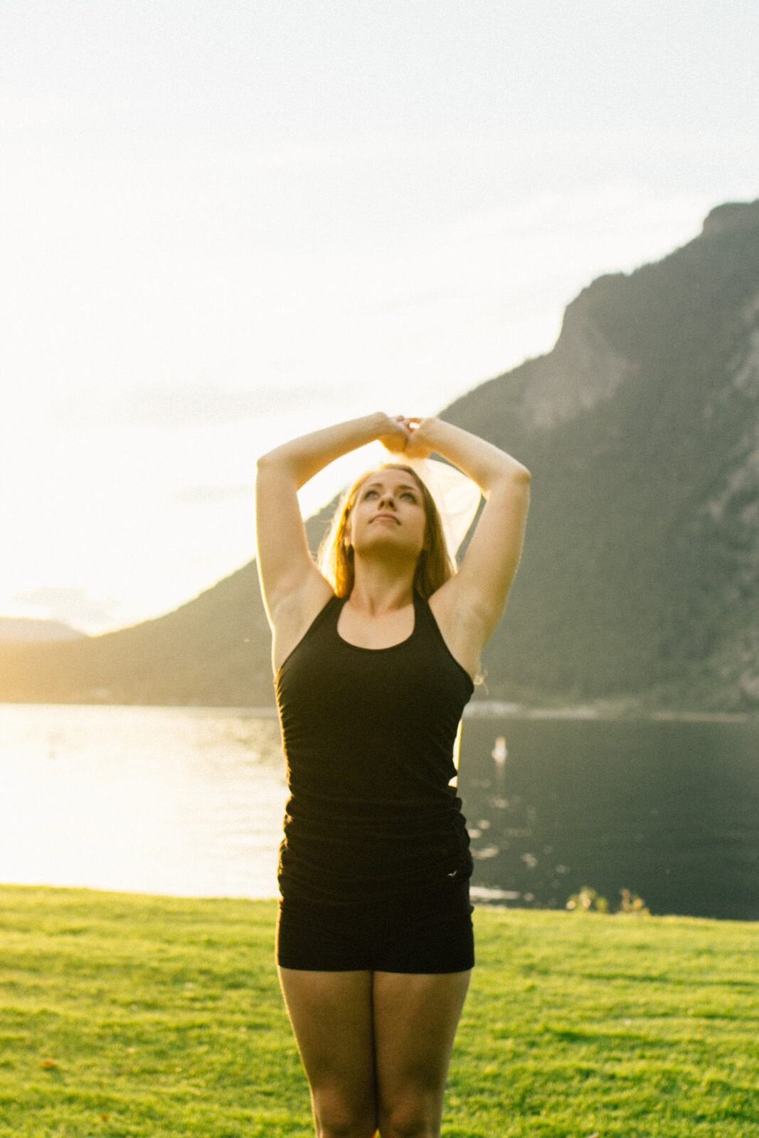 Shani Yoga corporate story frame 37: Wellness portraits for Shani with yoga movement, shoreline light and wooded settings, created for a personal brand with an active outdoor focus.