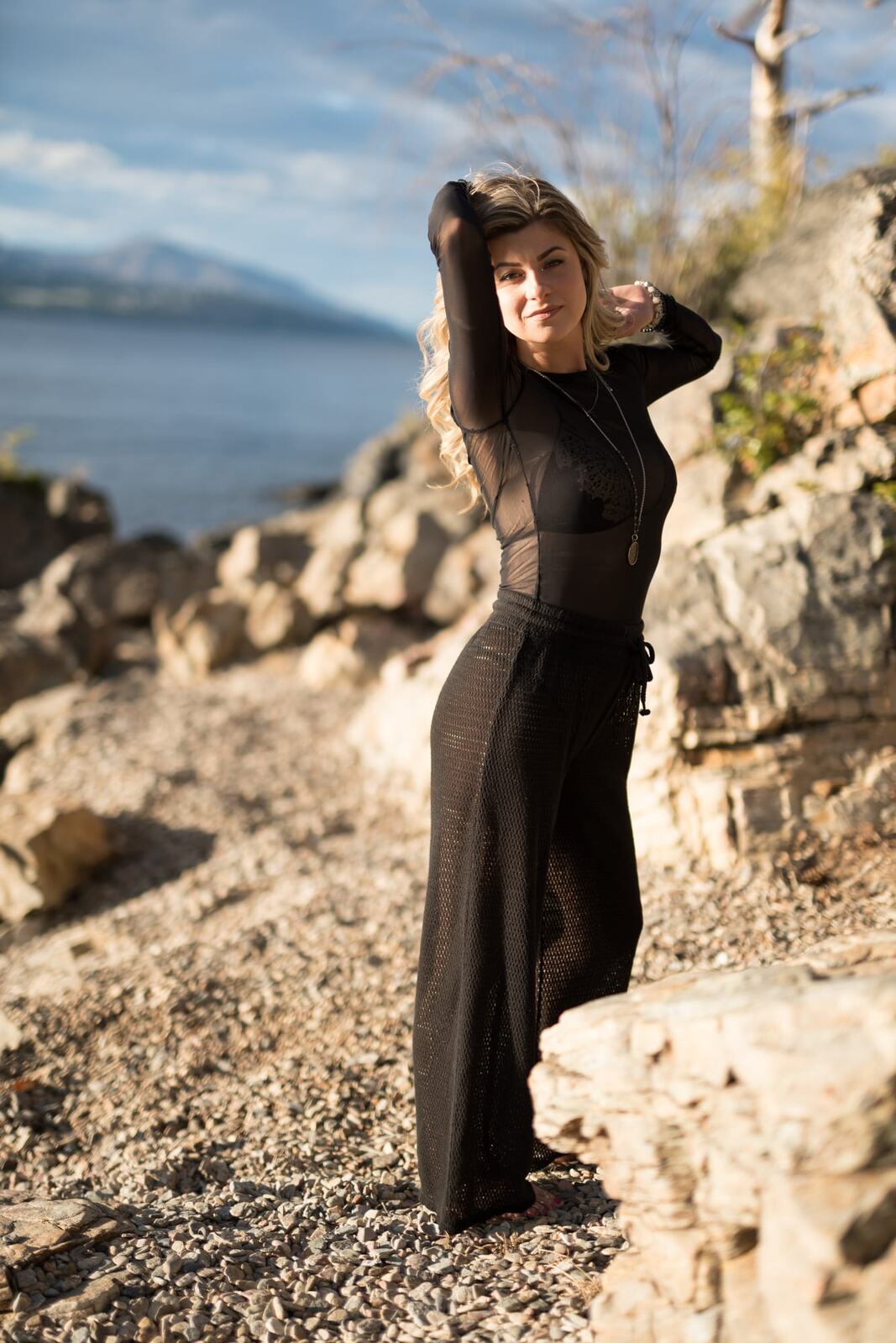 Sophia by the Water and Trees portraits story frame 6: Black outfits, water, trees, swimwear and a confident, sensual portrait story.