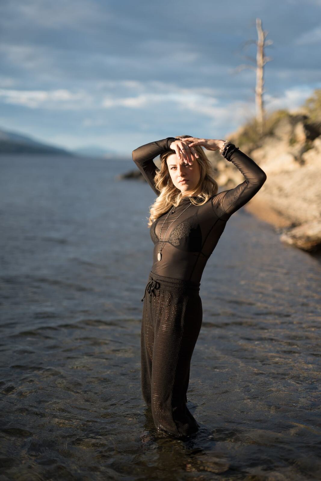 Sophia by the Water and Trees portraits story frame 9: Black outfits, water, trees, swimwear and a confident, sensual portrait story.