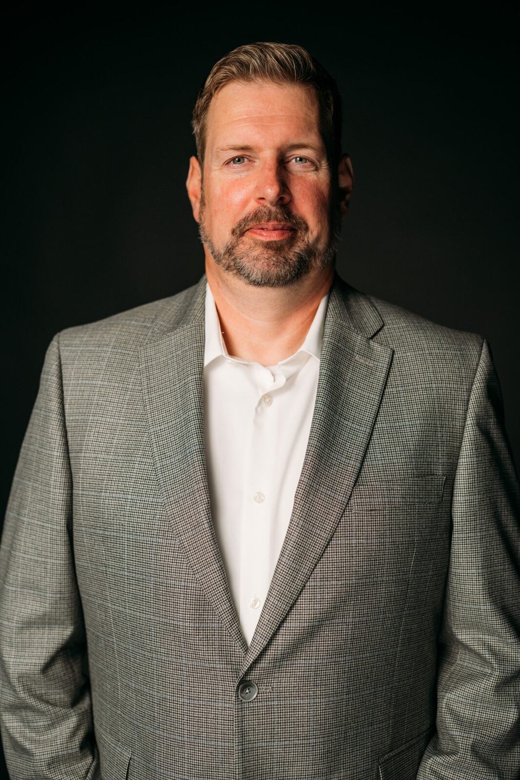 Team Bennett corporate story frame 16: Real estate team portraits in Kelowna, with individual headshots, group photos and clean marketing images for profiles, listings and business use..