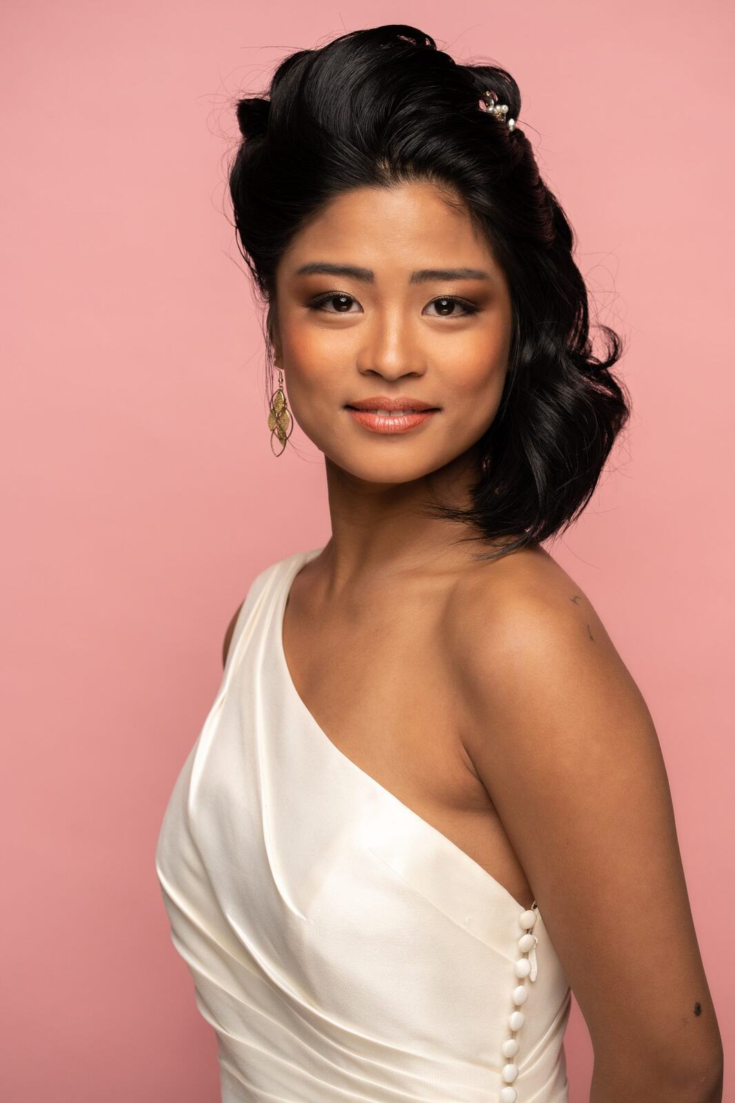 The Barbershoppe / Diva Den Bridal Formals corporate story frame 22: Collaborative bridal-formal brand photography for The Barbershoppe and Diva Den Day Spa, with hair, makeup, formal looks, studio portraits and campaign-ready beauty imagery..